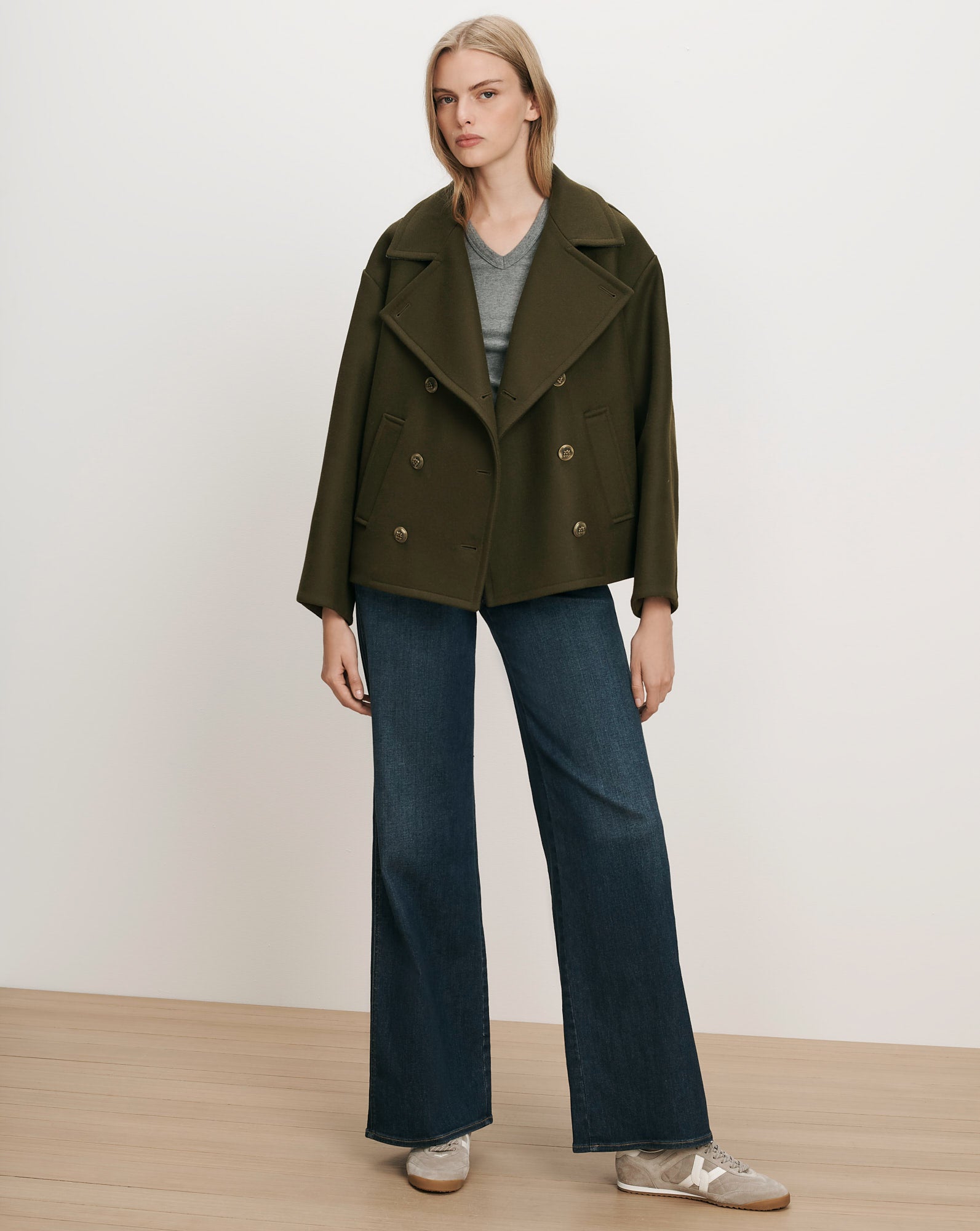 Veronica Beard Olive green wool peacoat with double-breasted buttons.