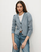 Veronica Beard Blue knit cardigan with puff sleeves.