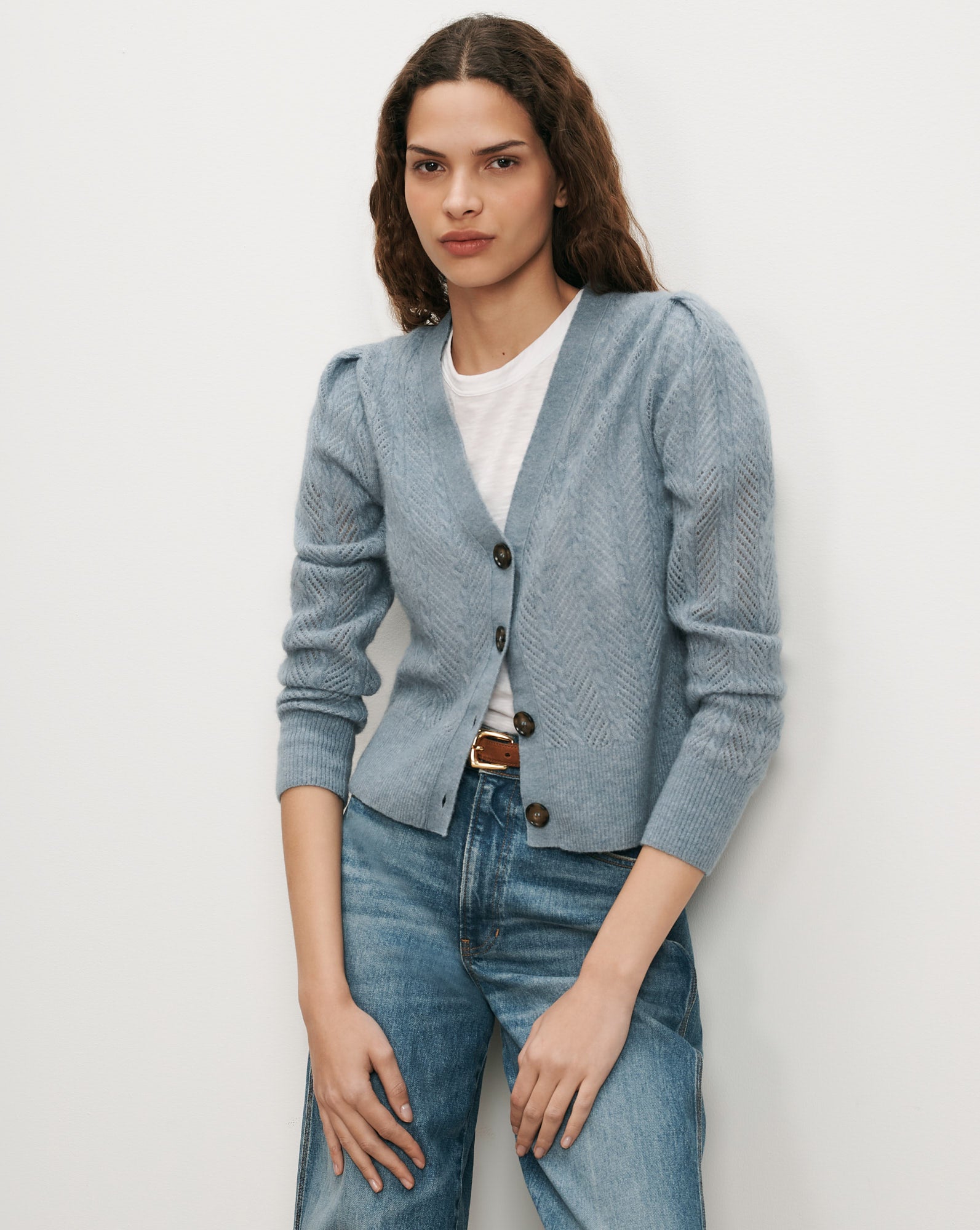 Veronica Beard Blue knit cardigan with puff sleeves.