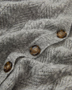 Veronica Beard Gray knit cardigan with brown buttons.