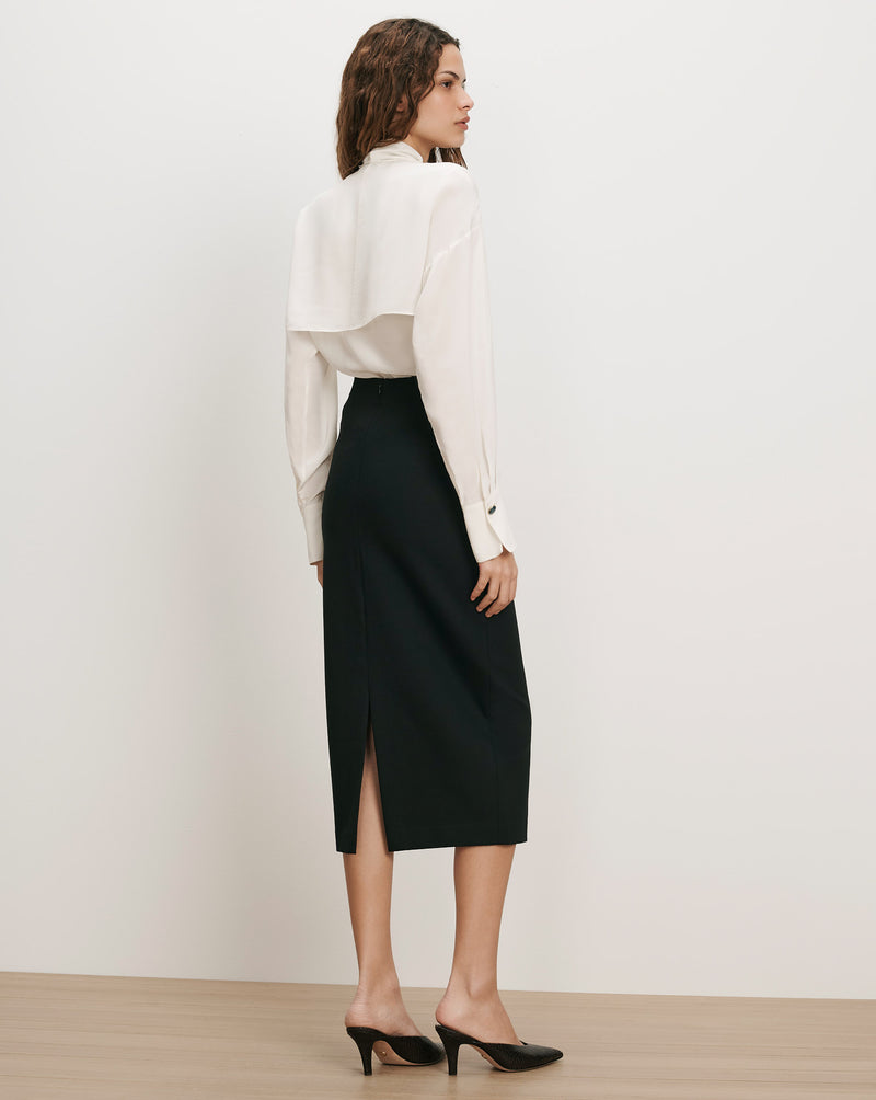 Veronica Beard Black pencil skirt, white silk blouse.