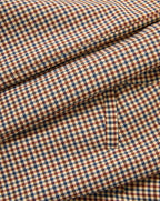 Veronica Beard Brown, blue, and beige houndstooth fabric.