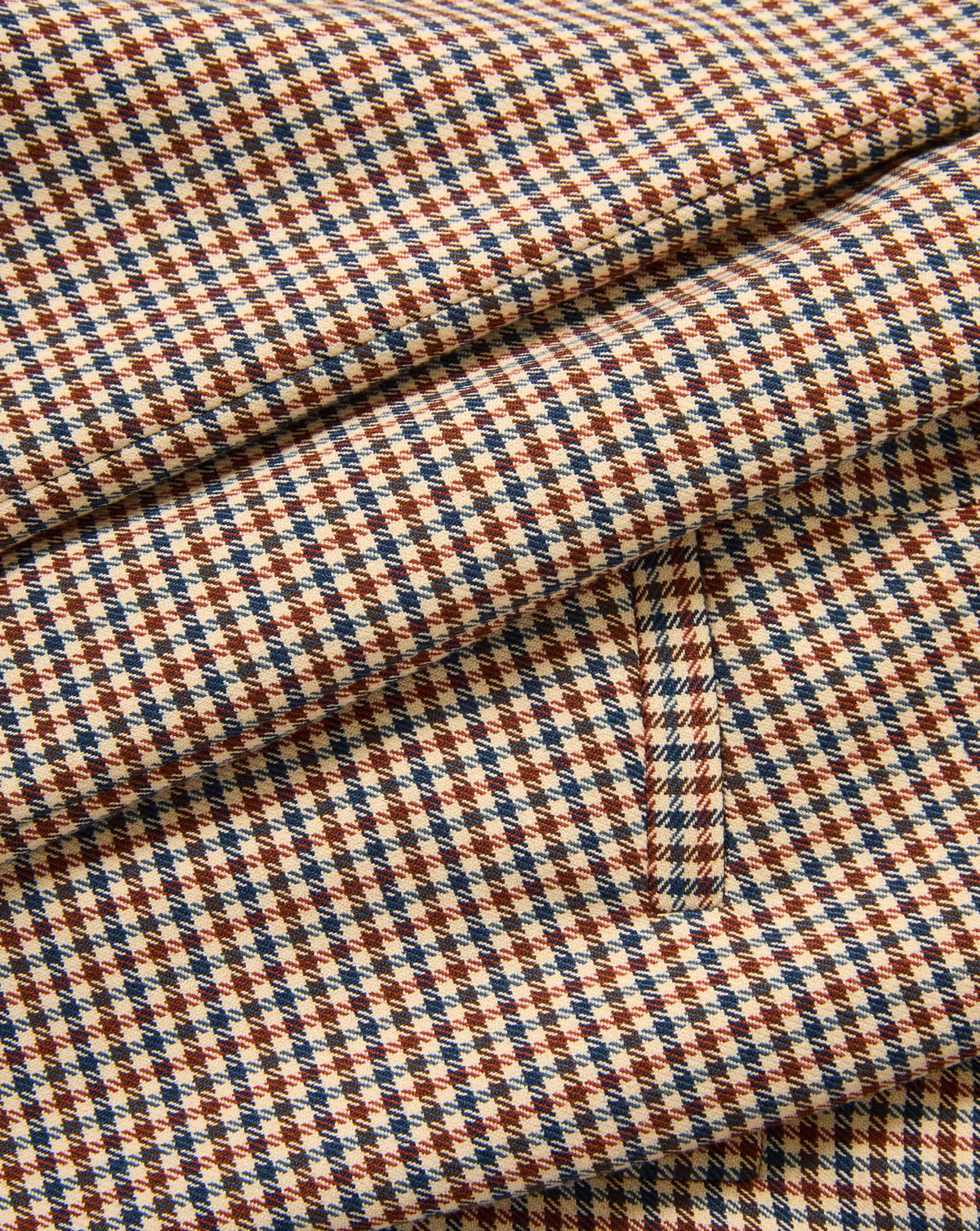 Veronica Beard Brown, blue, and beige houndstooth fabric.