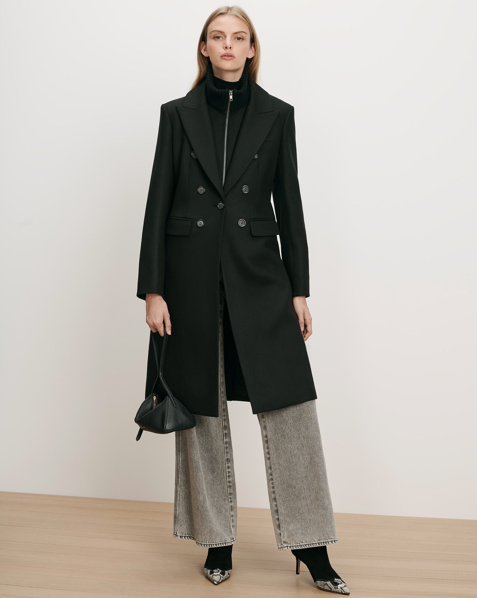 Veronica Beard Black double-breasted wool coat with notched lapels.