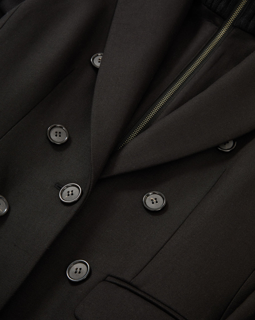 Veronica Beard Black double-breasted blazer with zipper detail.