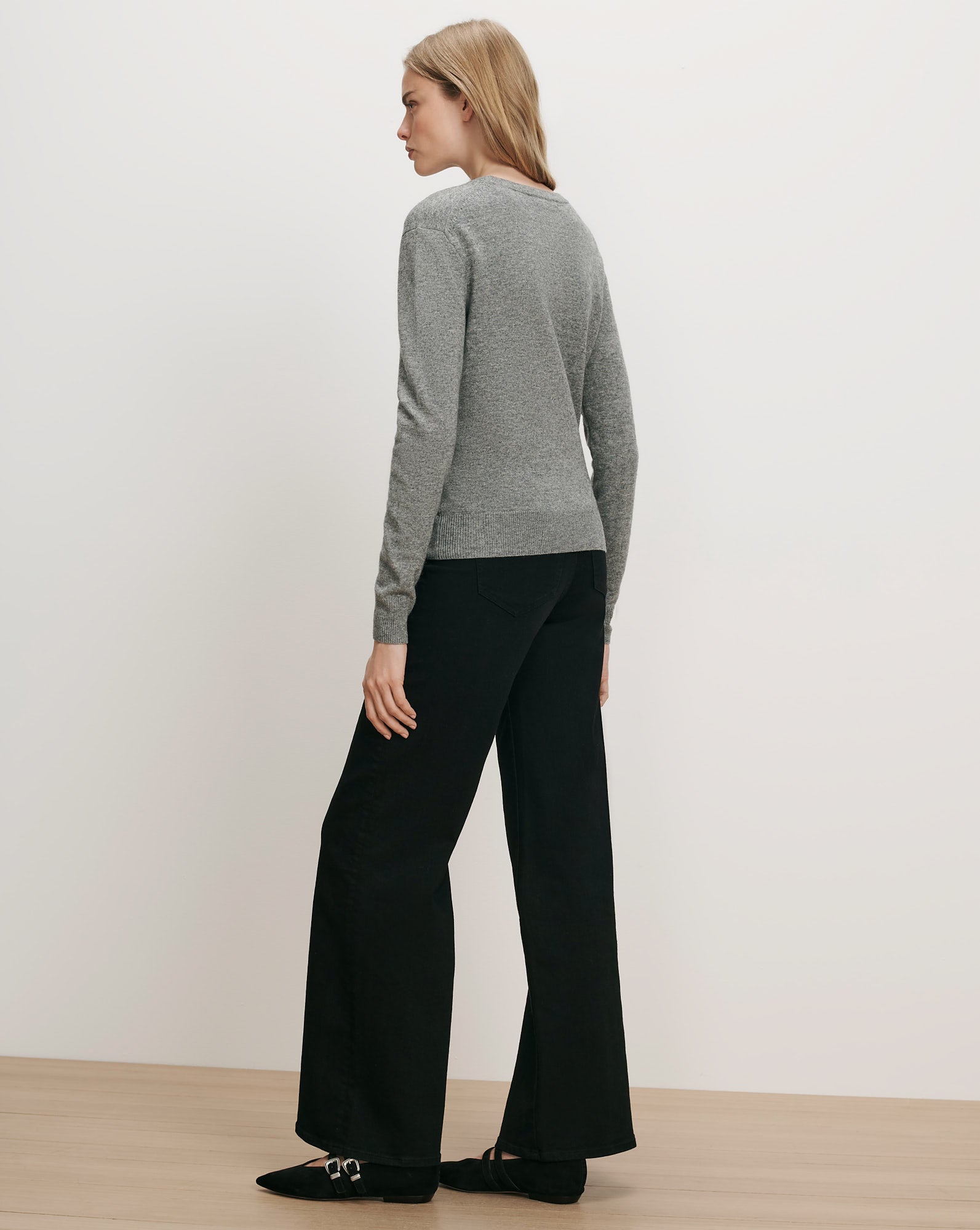 Veronica Beard Gray knit sweater, black wide-leg pants, black loafers