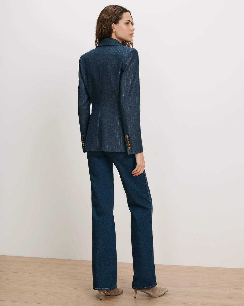 Veronica Beard Navy pinstripe blazer and matching wide-leg trousers.