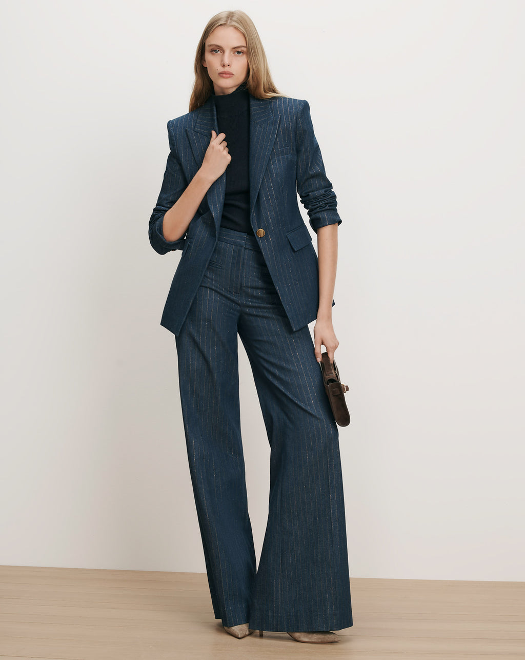 Veronica Beard Navy pinstripe suit with wide-leg pants and fitted blazer.