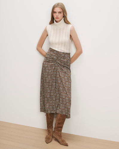 Veronica Beard White sleeveless turtleneck, brown floral ruched midi skirt.