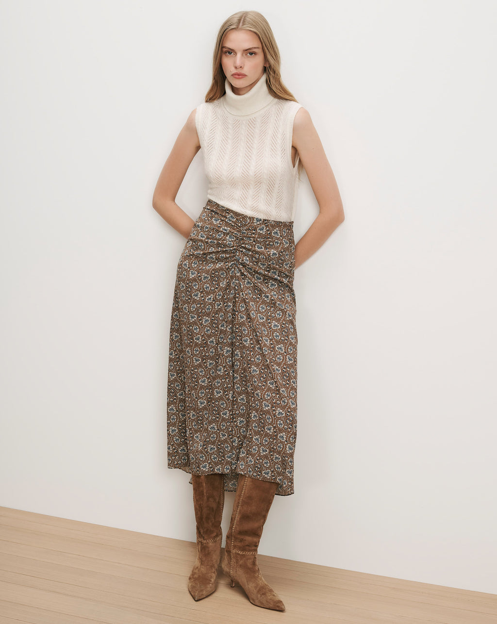 Veronica Beard White sleeveless turtleneck, brown floral ruched midi skirt.
