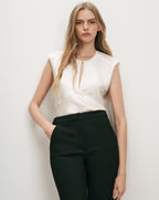 Veronica Beard White satin sleeveless blouse, black tailored trousers