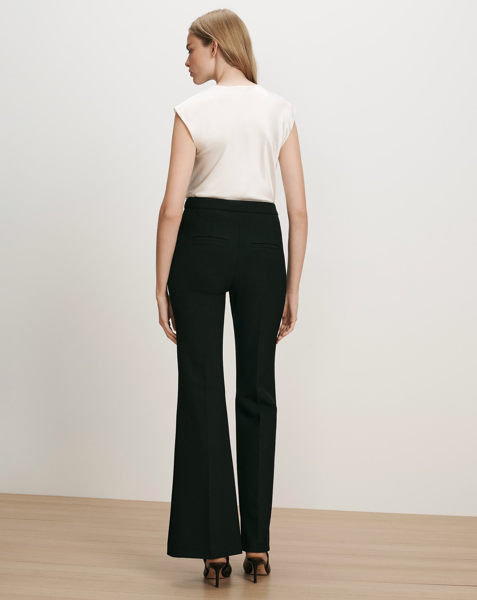 Veronica Beard Black flared trousers and white cap-sleeve top