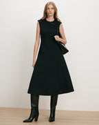 Veronica Beard Black sleeveless midi dress with A-line skirt.
