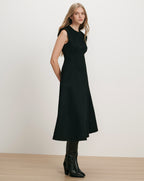Veronica Beard Black midi dress, sleeveless, with a flared skirt.