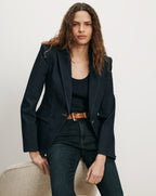Veronica Beard Dark blue denim blazer with white stitching.