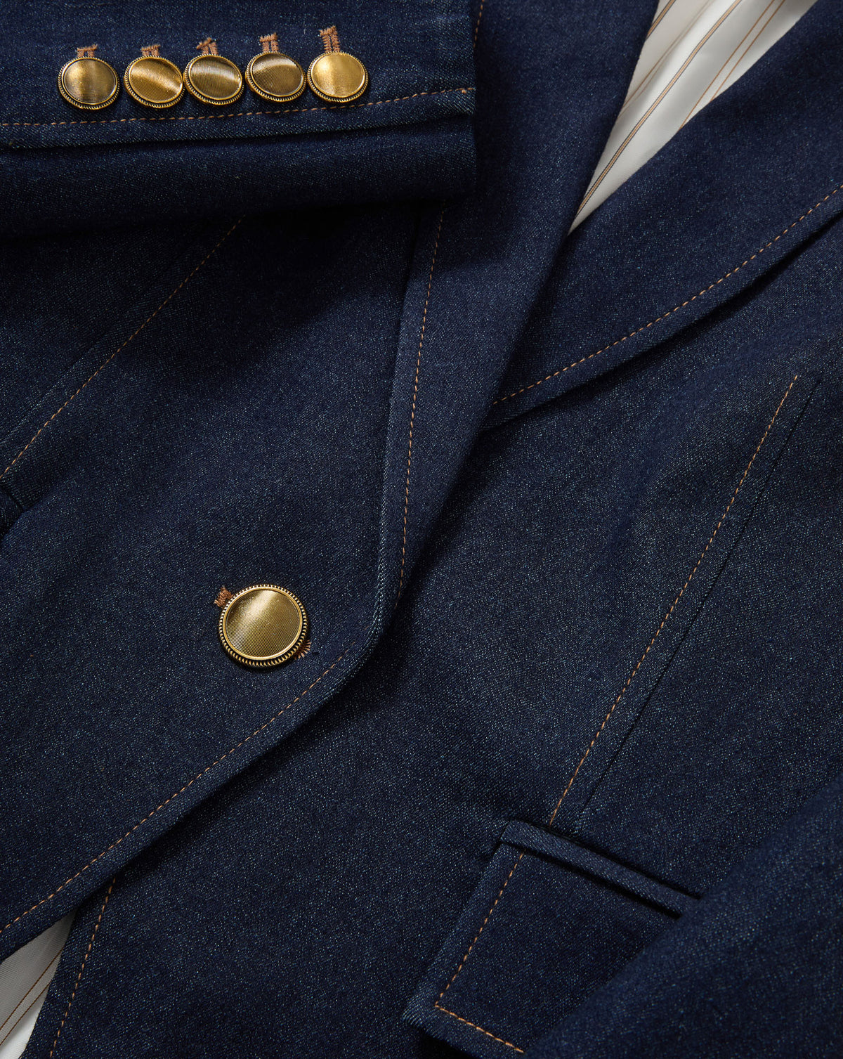 Veronica Beard Navy denim blazer with gold buttons.