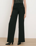 Veronica Beard Black wide-leg trousers with front patch pockets.