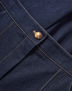 Veronica Beard Dark wash denim skirt with a single gold button.