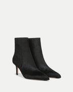 Veronica Beard Black calf hair ankle boots with stiletto heel.