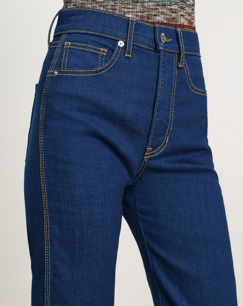 Veronica Beard Blue denim jeans with orange stitching.