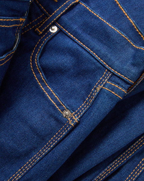 Veronica Beard Blue denim jeans with orange stitching and silver buttons.