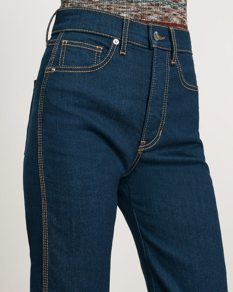 Veronica Beard Blue denim jeans with orange stitching.