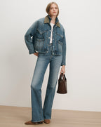 Veronica Beard Blue denim jacket and jeans, white t-shirt, brown handbag.