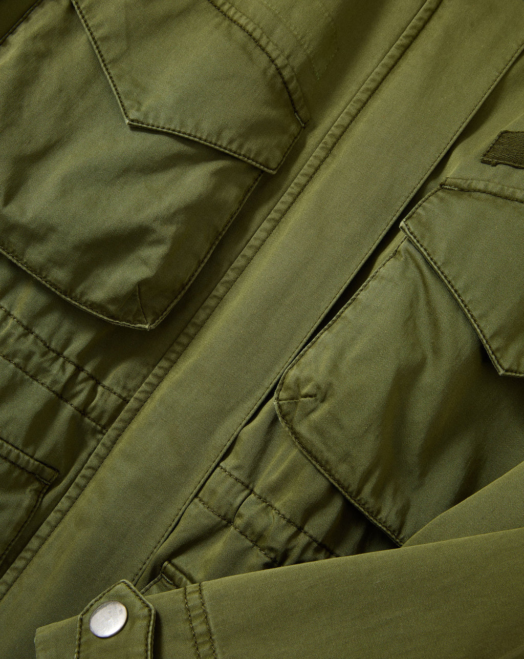 Veronica Beard Olive green cotton utility jacket with flap pockets.
