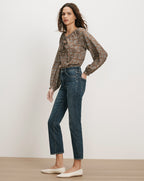 Veronica Beard Brown floral blouse, dark wash jeans.