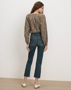 Veronica Beard Brown floral peasant blouse, dark wash flare jeans.