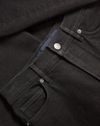 Veronica Beard Black denim jeans with silver button and rivets.