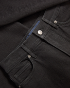 Veronica Beard Black denim jeans with silver button and rivets.
