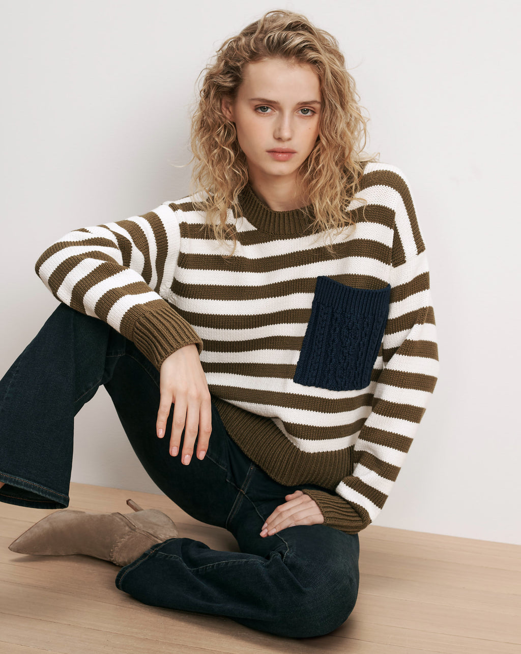 Veronica Beard Striped knit sweater with navy cable-knit pocket.
