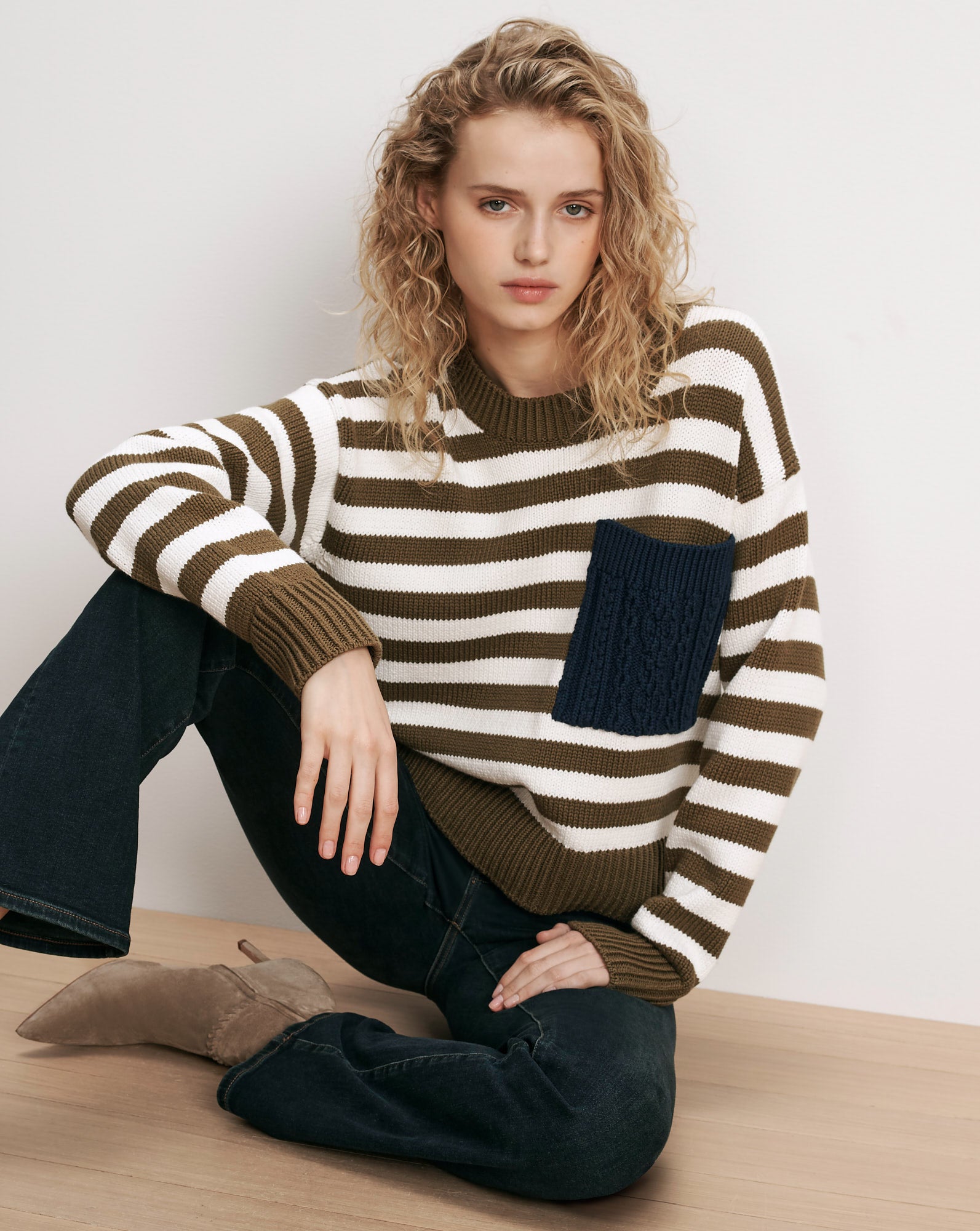 Veronica Beard Striped knit sweater with navy cable-knit pocket.