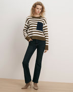 Veronica Beard Striped sweater with a navy knit pocket.