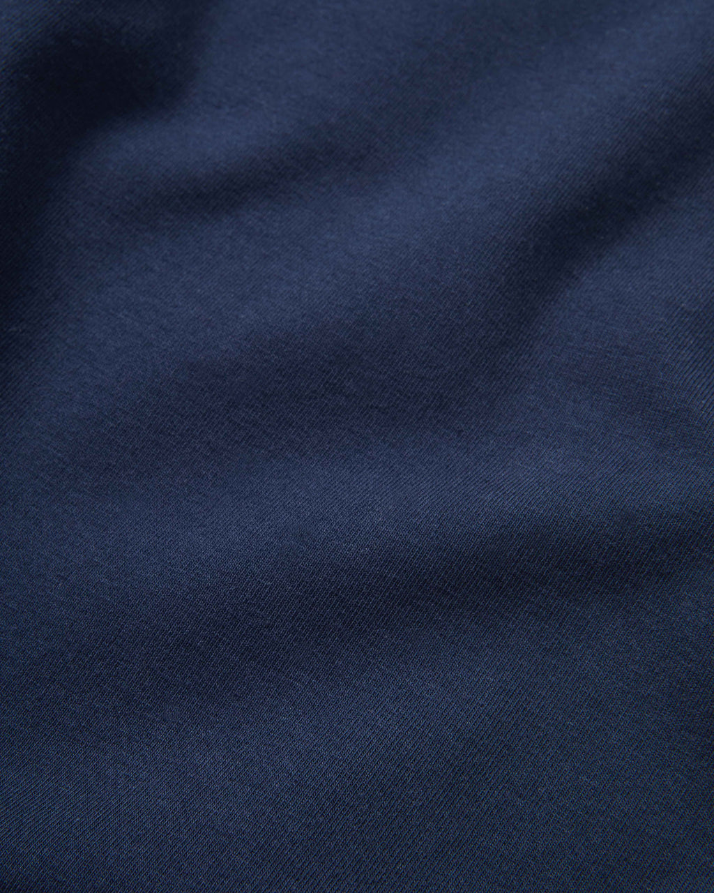 Veronica Beard Navy blue fabric with subtle folds.