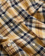 Veronica Beard Plaid shirt with white buttons.