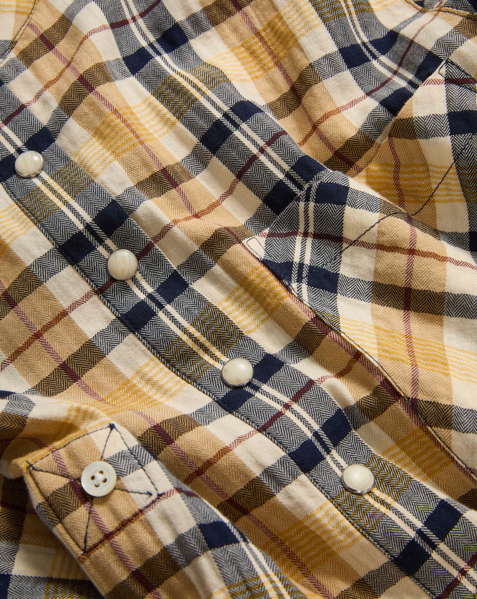 Veronica Beard Plaid shirt with white buttons.