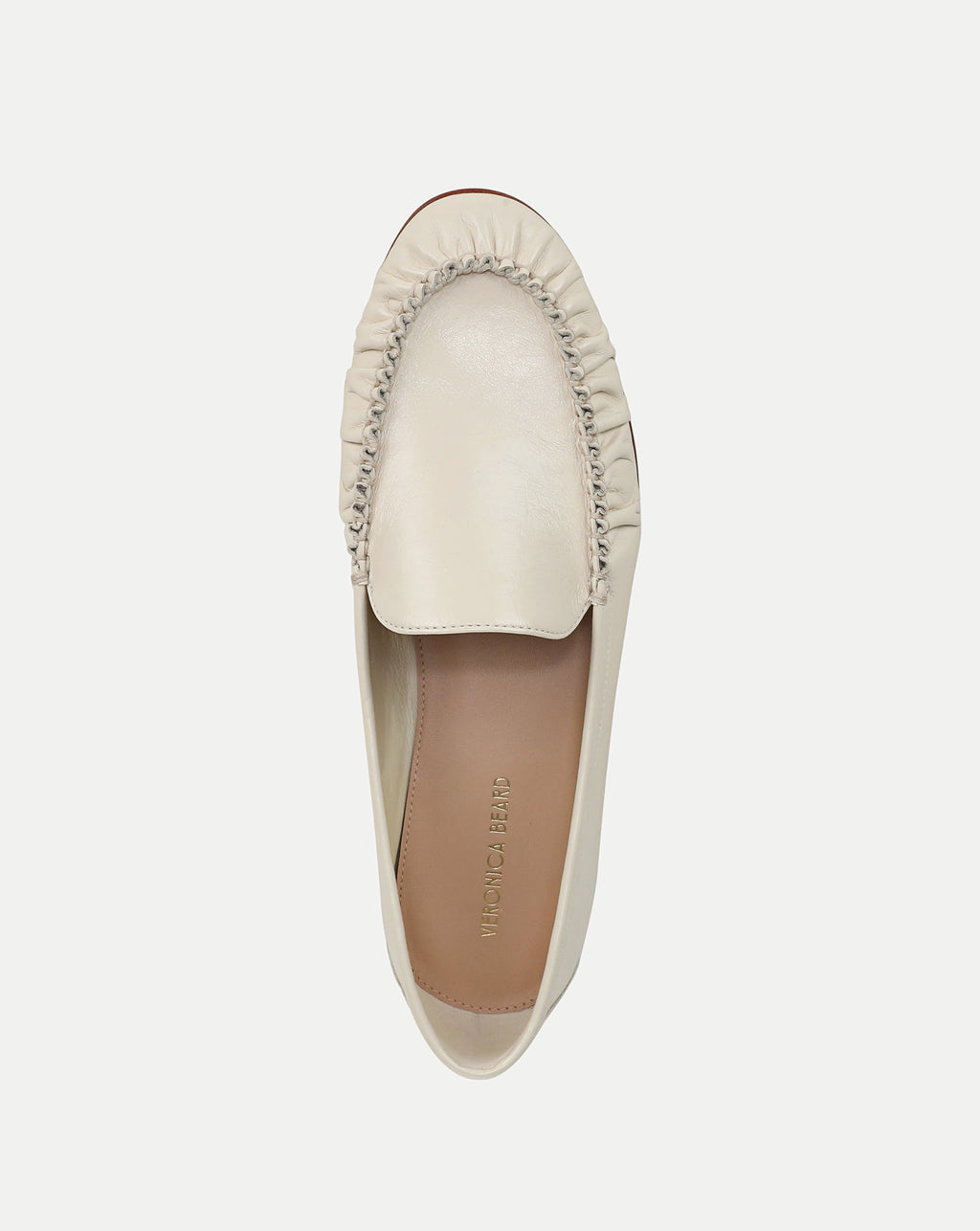Veronica Beard Cream leather loafers with gathered edge detailing.