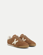 Veronica Beard Brown suede sneakers with white accents.