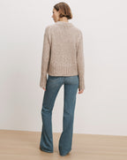 Veronica Beard Beige knit sweater, blue flared jeans