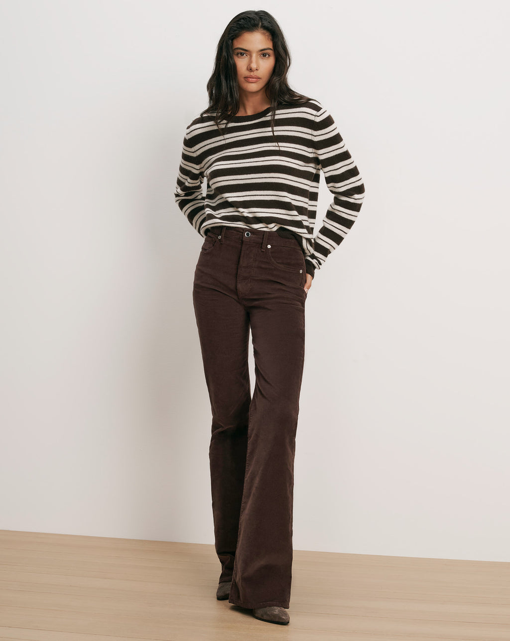 Veronica Beard Brown and white striped sweater, brown corduroy flare pants.