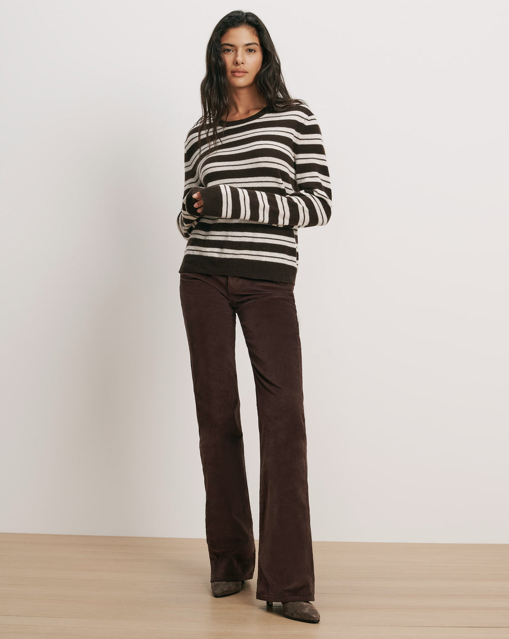 Veronica Beard Brown and white striped sweater, brown corduroy pants.