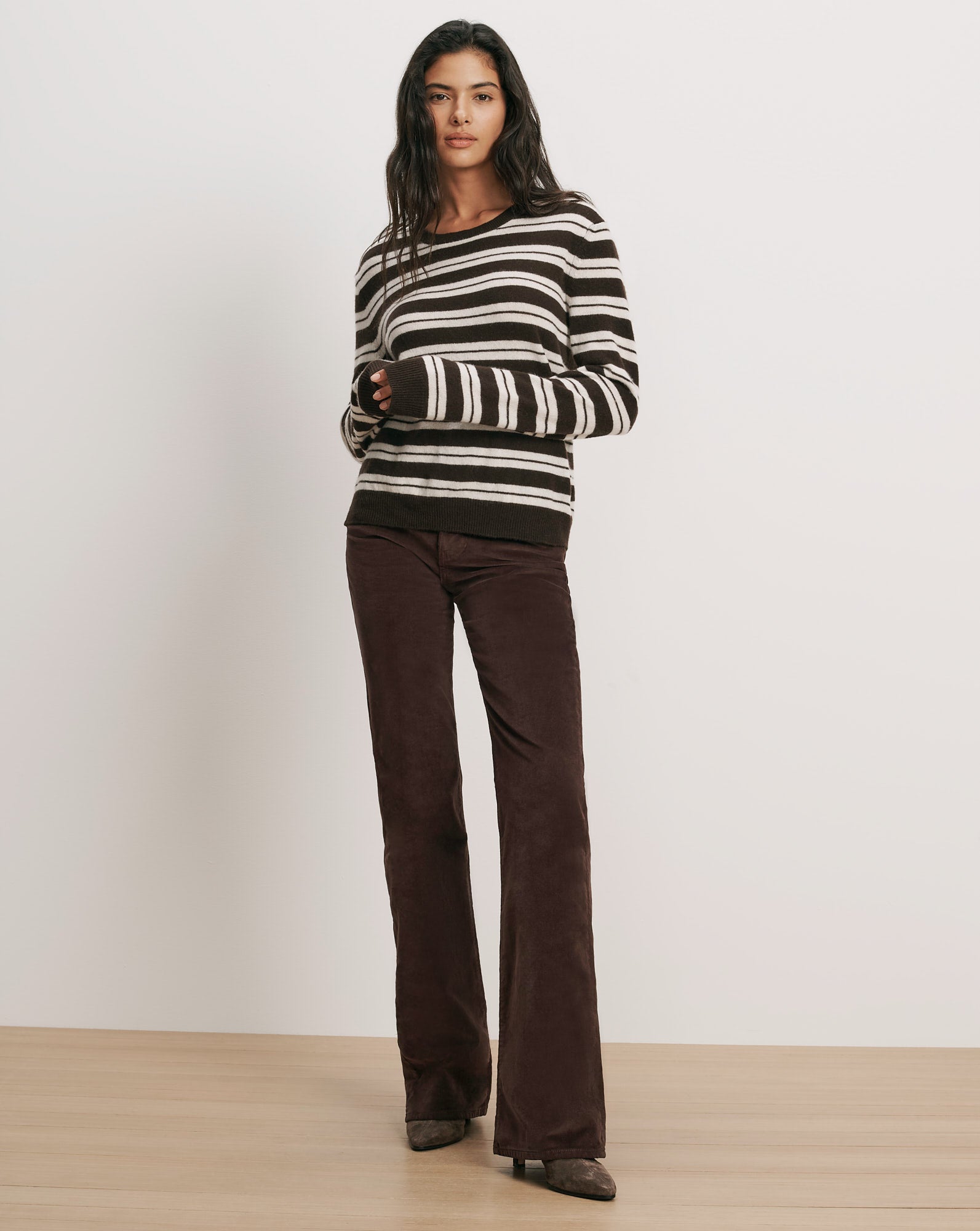 Veronica Beard Brown and white striped sweater, brown corduroy pants.