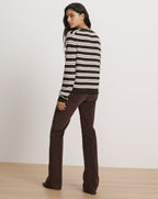 Veronica Beard Brown and white striped sweater, brown corduroy pants.