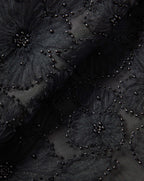 Veronica Beard Black beaded floral mesh fabric.