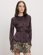 Veronica Beard Plum satin blouse with ruched sides.
