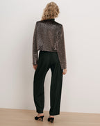 Veronica Beard Brown sequin cropped jacket and black trousers.