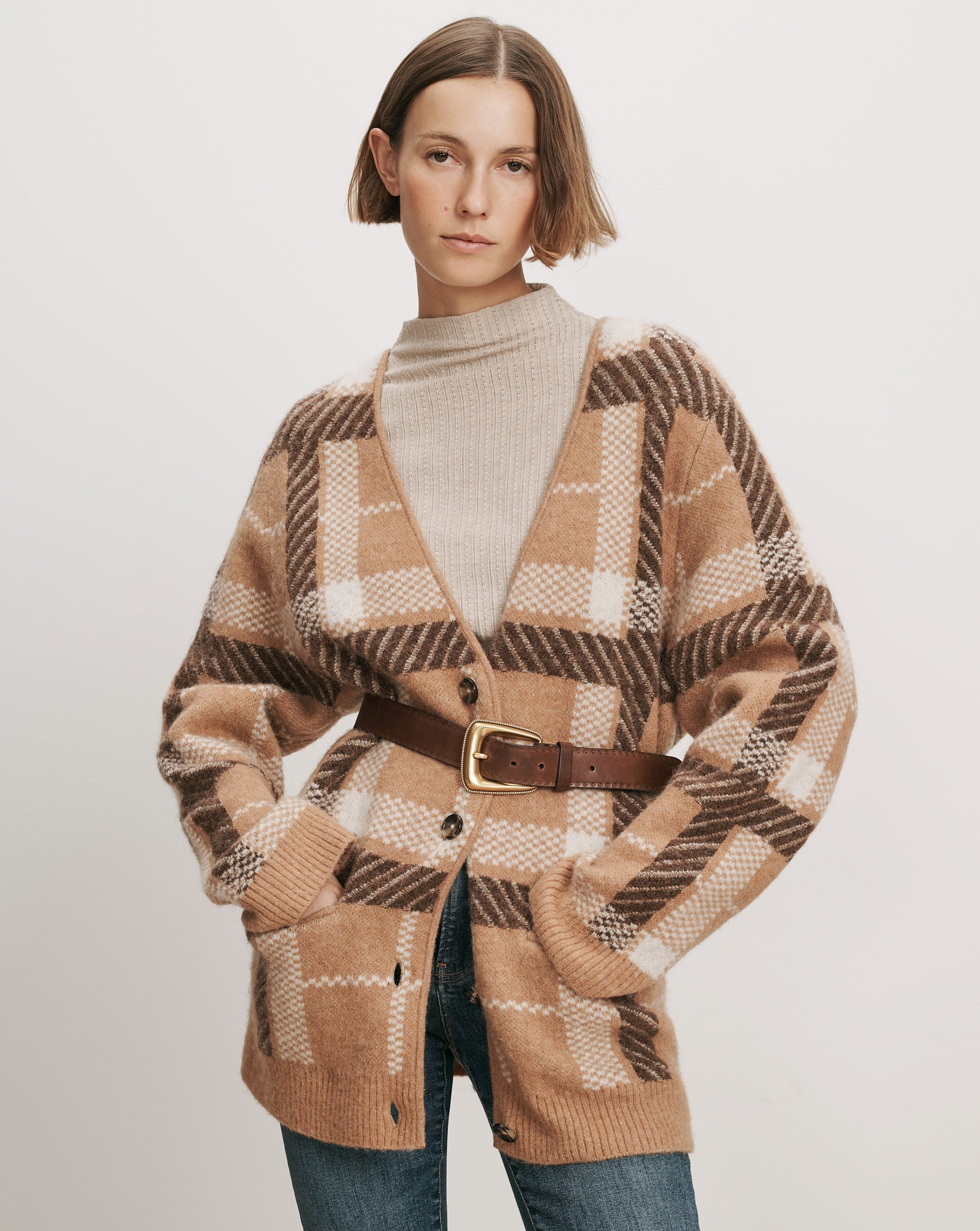 Veronica Beard Tan plaid knit cardigan with brown belt.