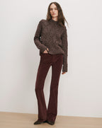 Veronica Beard Brown marled sweater and brown corduroy flare pants.